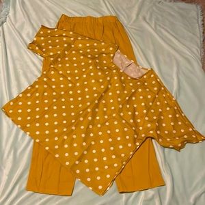 Yellow with polkadots on the shirt and yellow pants
